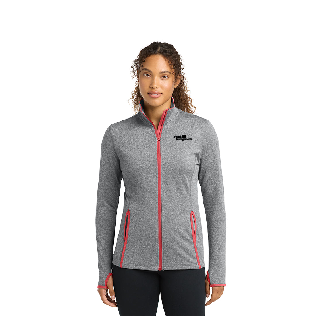 Woman wearing a gray and hot coral jacket with a logo on a white background