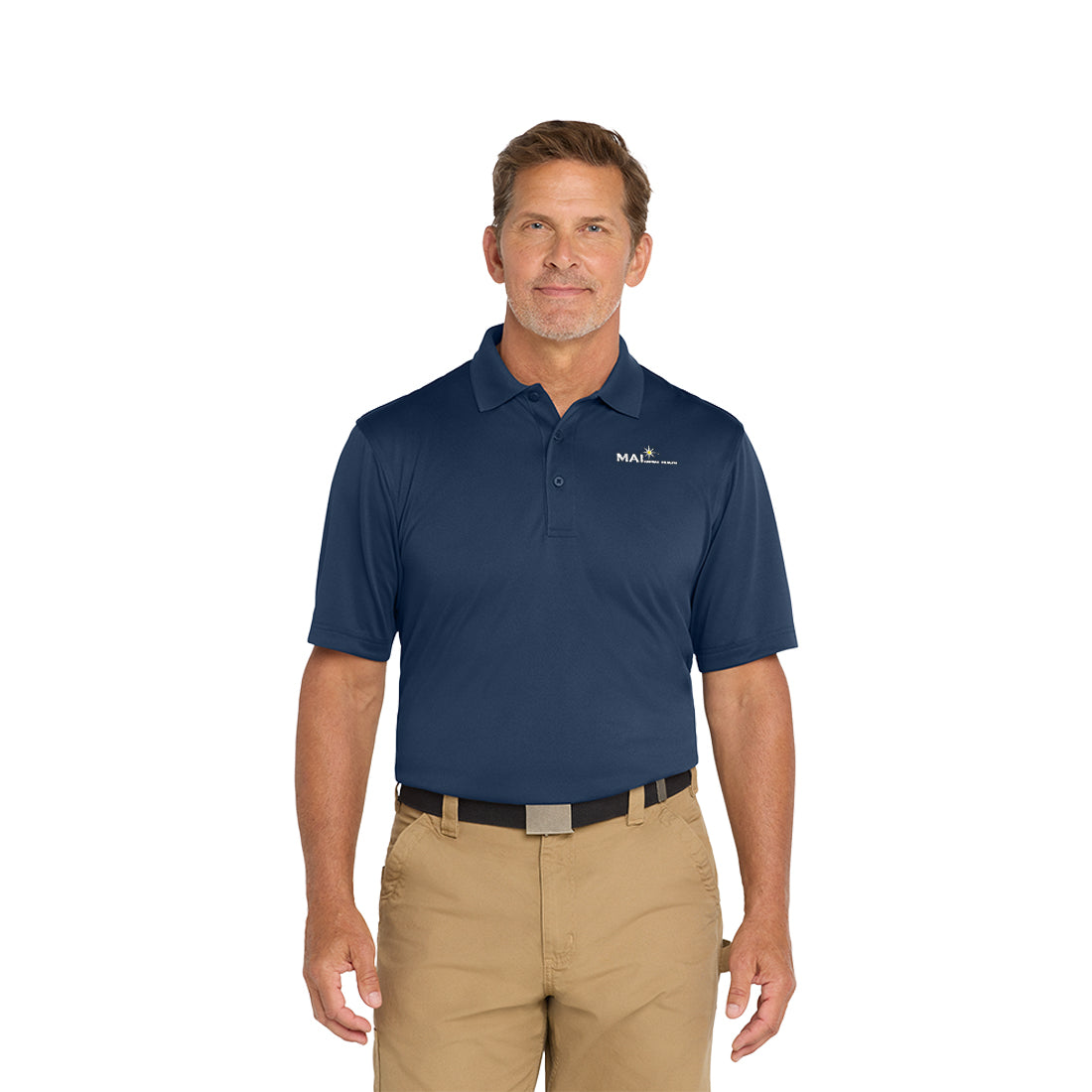 Man wearing a navy blue polo shirt and beige pants on a white background