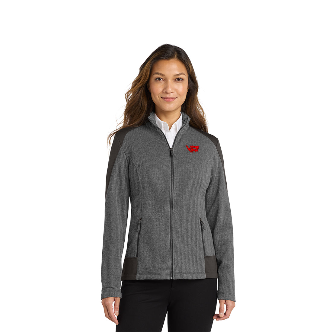 Woman wearing a gray zip up jacket with a logo on a white background